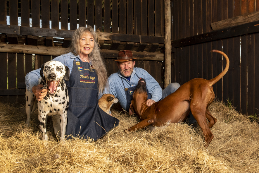 Photo of Heather and Kevin Harvey with their dogs