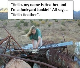 A photo of a lady looking through a junkyard